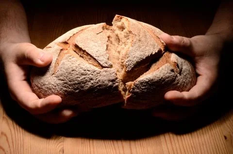 Breaking bread Stock Photos