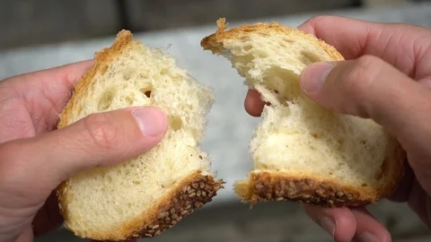 Breaking of Bread, Slow Motion Stock Footage 108548693