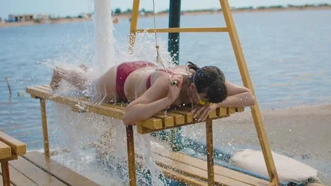 Breaking cellulite with a stream of water. Stock Footage 129008329