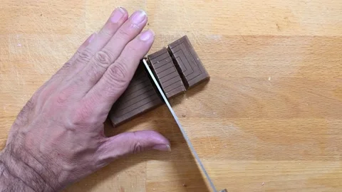 Breaking chocolate nougat Stock Footage 228223788
