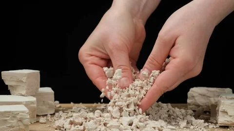 Breaking Compressed Fresh Yeast in the Kitchen. Slow Motion Stock Footage 311727136