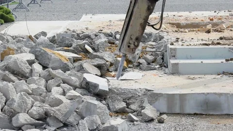 Breaking concrete with machine drilling or pneumatic hammer Stock Footage 231016713