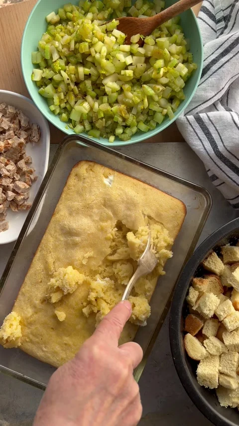 Breaking up cornbread for stuffing Stock Footage 223201204