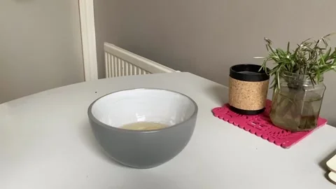 Breaking an egg Stock Footage 134044212