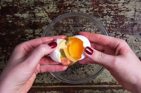 Breaking the egg Stock Photos
