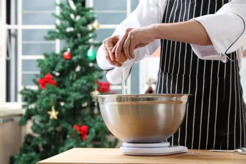 Breaking egg Stock Photos