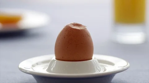 Breaking egg in slow motion Stock Footage 73605342