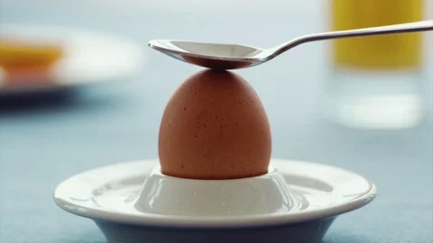 Breaking egg in slow motion Stock Footage 73605349