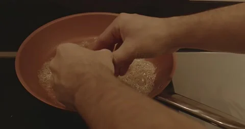 Breaking eggs and tossing them into the pan Video stock 145796271