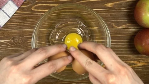 Breaking eggs in bowl. Stock Footage 88528108