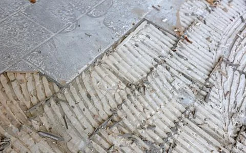 Breaking up floor tiles Stock Photos