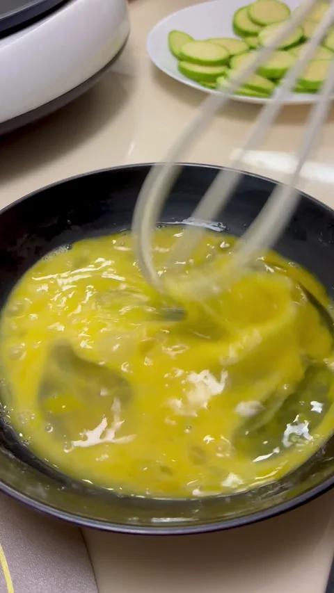 Breaking fresh eggs and whisking for cooking, close-up Stock Footage 329285099