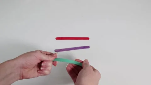 Breaking Ice Cream Sticks Tutorial Stock Footage 294510909