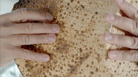 Breaking Matzah on Passover - Super slow motion Stock Footage 177656749