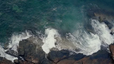 Breaking ocean waves at the cliffs, Aerial view 4K UHD Stock Footage 81319532