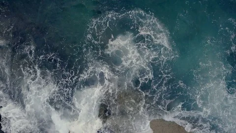 Breaking ocean waves at the cliffs, Aerial view 4K UHD Stock Footage 81320516