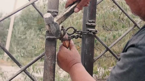 Breaking a padlock. Stock Footage 252129326