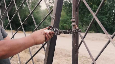 Breaking a padlock. Stock Footage 252129542