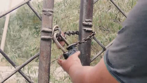 Breaking a padlock. Stock Footage 252129618