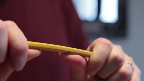 Breaking a pencil Stock Footage 326265381