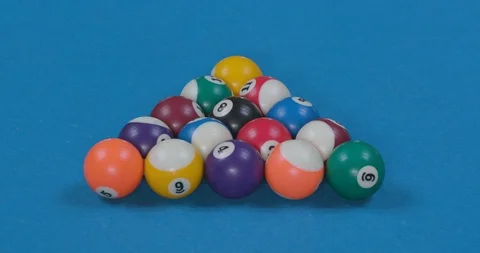 Breaking Racked Pool Balls in Eight-Ball Formation on Blue Billiards Table Stock Footage 88226837