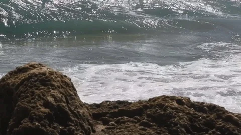 Breaking Rock Surf - Slo-mo Stock Footage 118718923