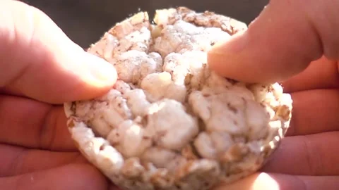 Breaking a round piece of bread in slow motion Stock Footage 141501794