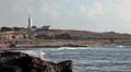 Breaking sea waves on lighthouse background, Mediterranean sea HD Footage