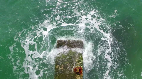 Breaking Sea Waves With Splashing On Pier. Airview Stock Footage 63091298