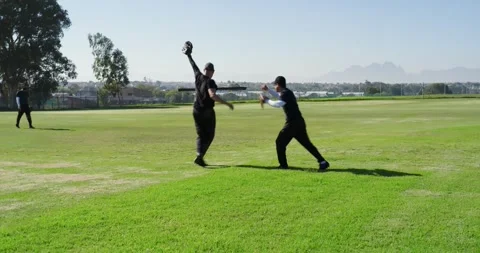 Breaking into sprint as baseball arcing toward outfielder diving while securing Stock Footage 342798759