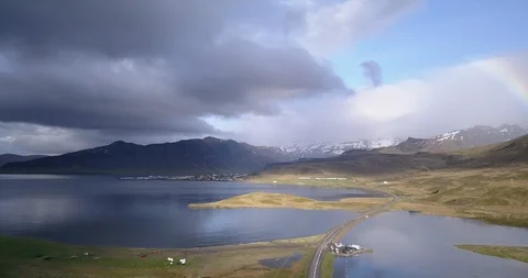 A breaking storm reveals a rainbow Stock Footage 101772473