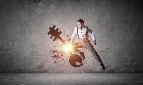 Breaking through access concept with furious man in room crashin 스톡 사진