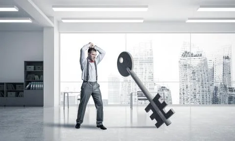 Breaking through access concept with furious man crashing concre Stock Photos