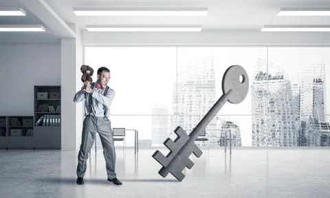 Breaking through access concept with furious man crashing concre Stock Photos