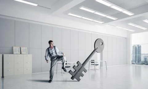 Breaking through access concept with furious man crashing concre Stock Photos