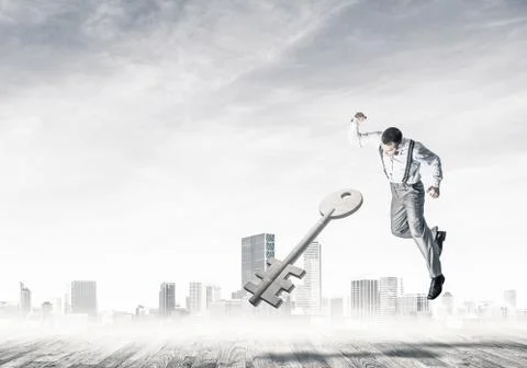 Breaking through access concept with furious man crashing concre Stock Photos