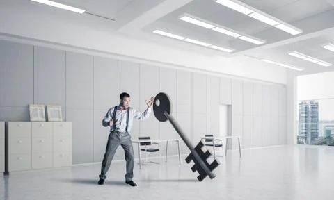 Breaking through access concept with furious man crashing concre Stock Photos