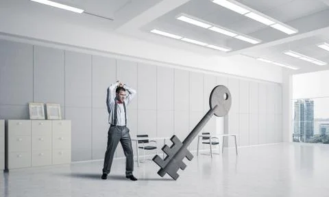 Breaking through access concept with furious man crashing concre Stock Photos