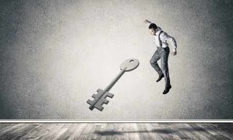 Breaking through access concept with man in room crashing concre Stock Photos