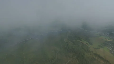 Breaking Through Clouds to Reveal a Scenic Lake 動画素材 313991833