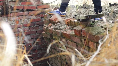 Breaking throw down the red bricks, slow motion Stock-Footage 57322921