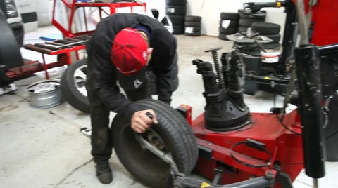 Breaking the tire off from the rim Stock Footage 36347363