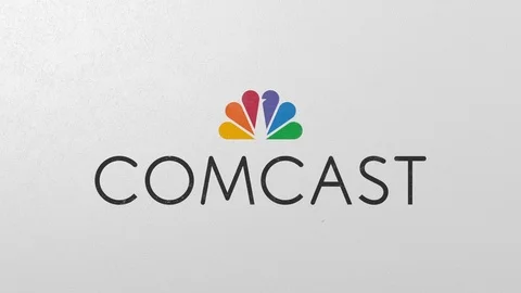 Breaking wall with painted logo of Comcast. Crisis related editorial 3D Stock Footage 111903923