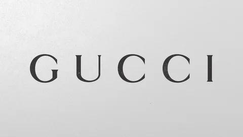 Breaking wall with painted logo of Gucci. Crisis conceptual editorial 3D Stock Footage 105685971