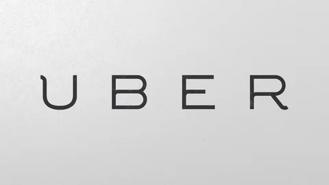 Breaking wall with painted logo of Uber. Crisis conceptual editorial 3D Stock Footage 105760064