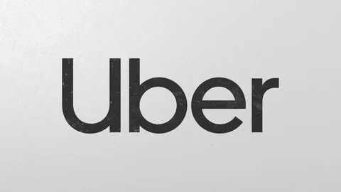 Breaking wall with painted logo of Uber. Crisis related editorial 3D animation Stock Footage 111896292