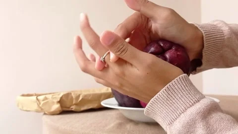 Breaking a water apple with hand Stock Footage 146248917