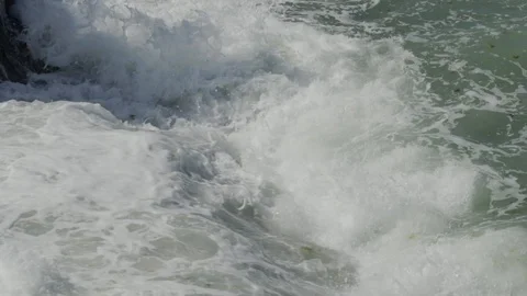 Breaking wave on cliff Stock Footage 86445147