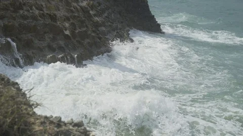 Breaking wave on cliff Stock Footage 86445148