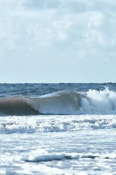 Breaking wave at coast of denmark Stock Photos